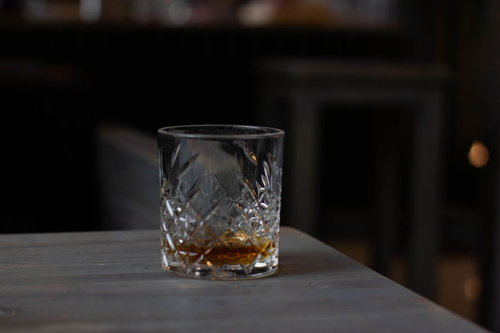 Cognac in a cut crystal glass on a table