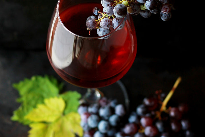 Friends sharing wine on a summer evening